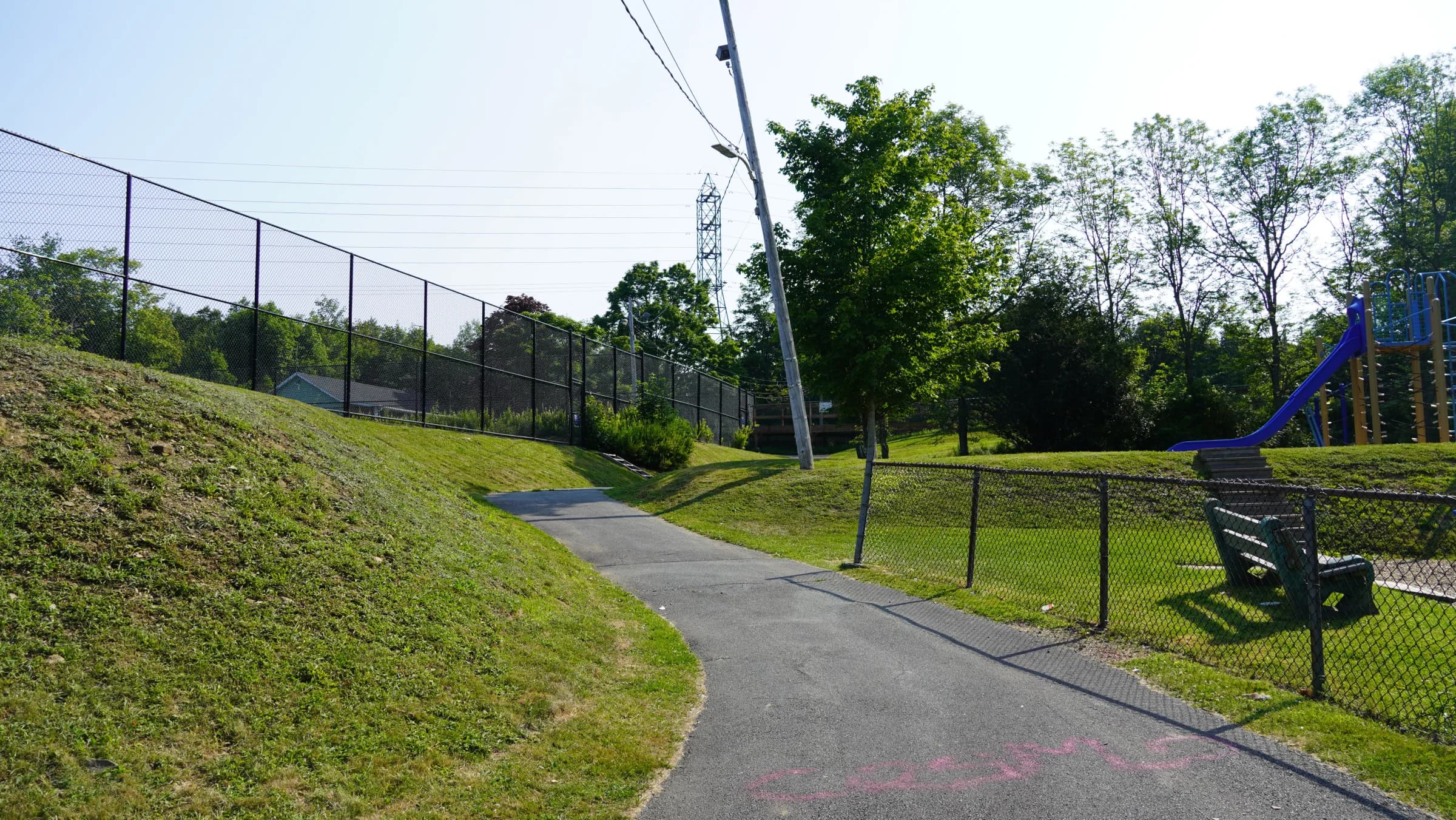 Club entrance gate beside the tennis courts